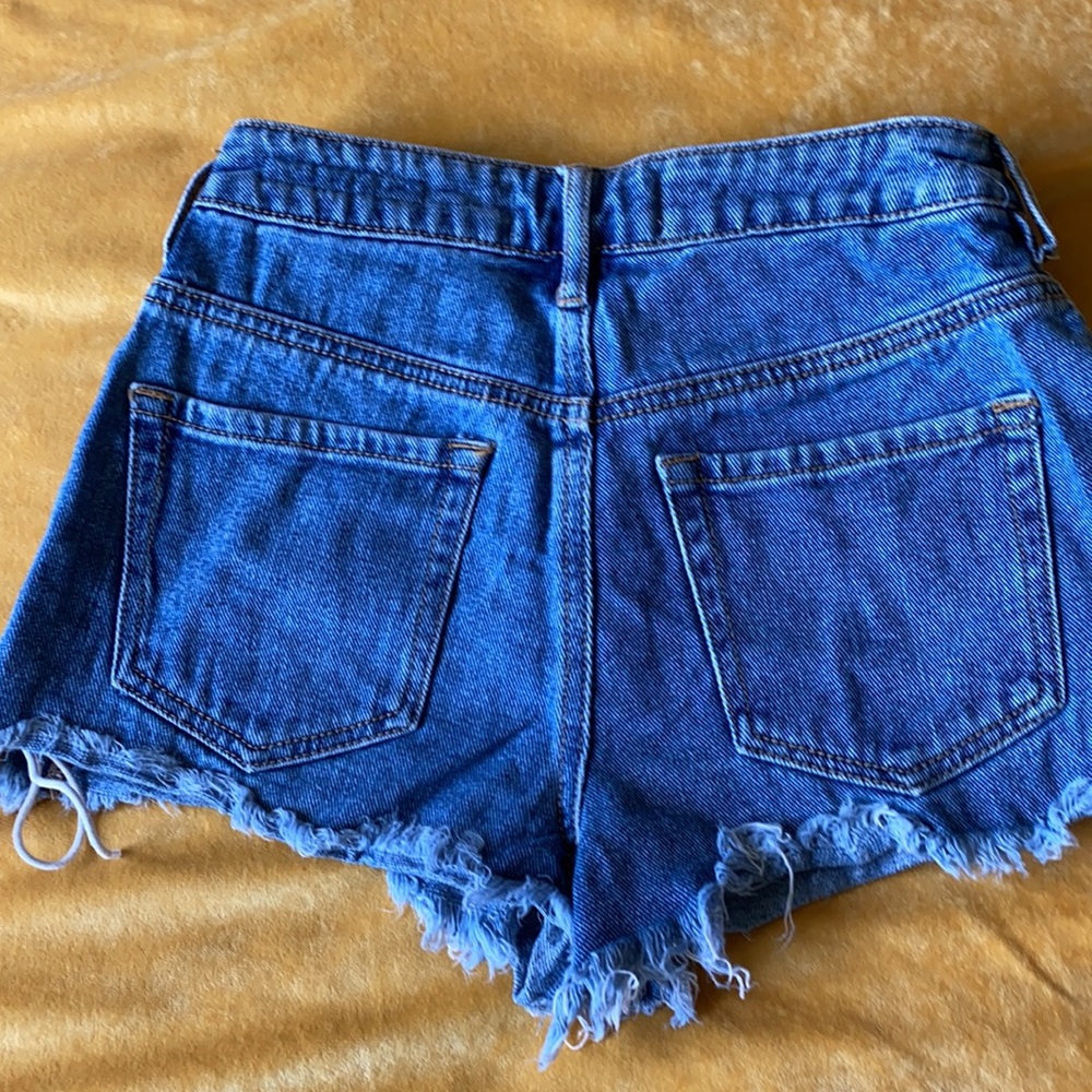 Pac sun traditional wash with adorable detailing!